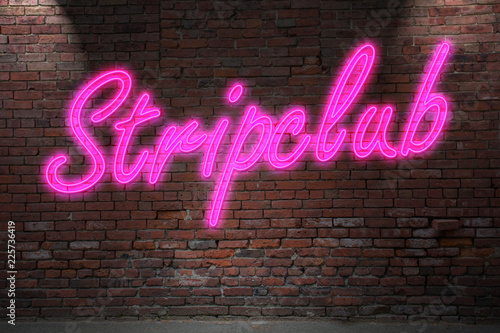 Neon Stripclub Lettering on Brick Wall
