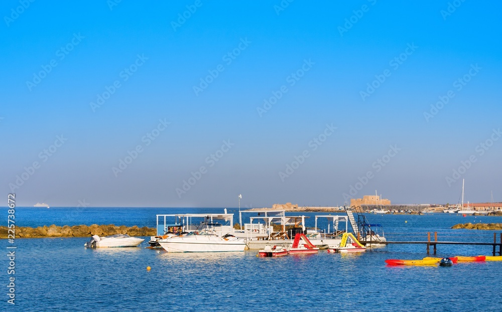 Yachts for rent near pier. Mediterranean Sea coast of Paphos, Cyprus
