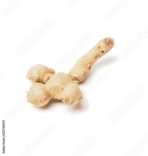 Tasty ginger root on white
