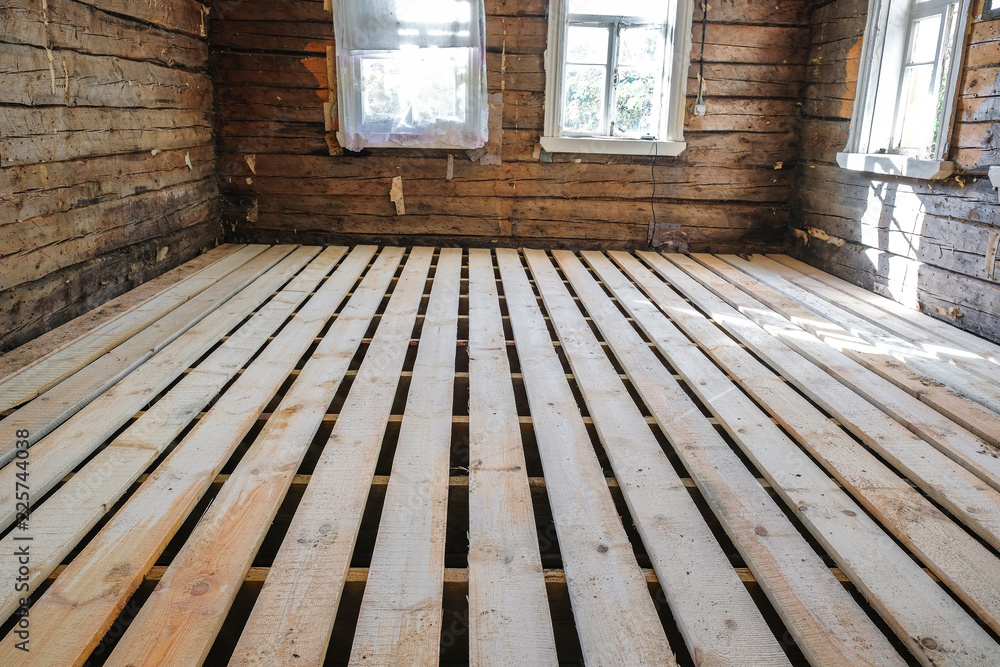 the floor construction in an old wooden house - obrazy, fototapety, plakaty 