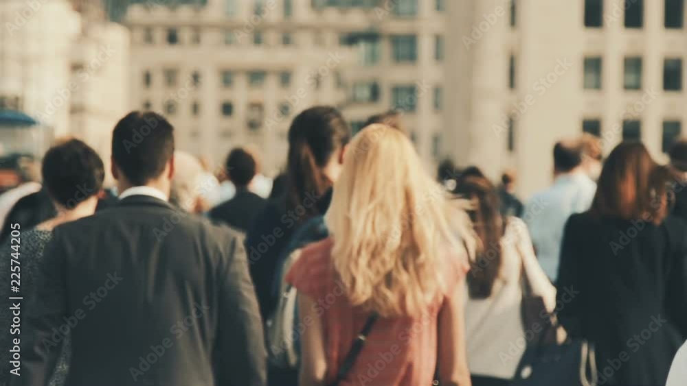 Anonymous crowd of people walking in London. Business people crossing the London Bridge. 120fps Anonymous crowd of people walking in London. Business people crossing the London Bridge. 120fps
