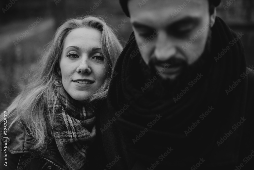 Portrait of couple. Young couple in love and fun, hug and travel in the nature. The concept of tenderness and affection. Romantic black and white photo