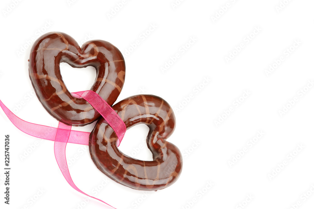 Gingerbread in the form of hearts isolated on white background. Free space for text. Gingerbread in the form of hearts isolated on white background. Free space for text.