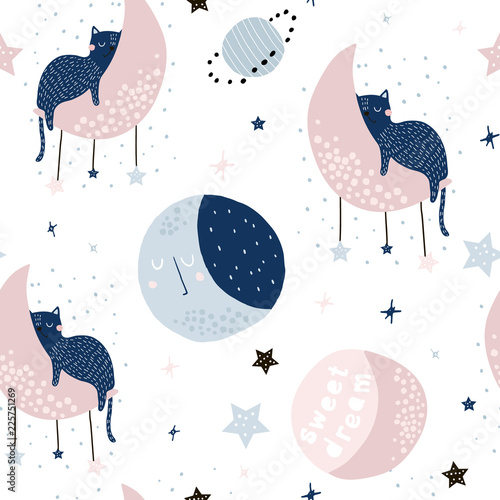 Fototapeta Seamless childish pattern with cats on moons and starry sky. Creative kids texture for fabric, wrapping, textile, wallpaper, apparel. Vector illustration