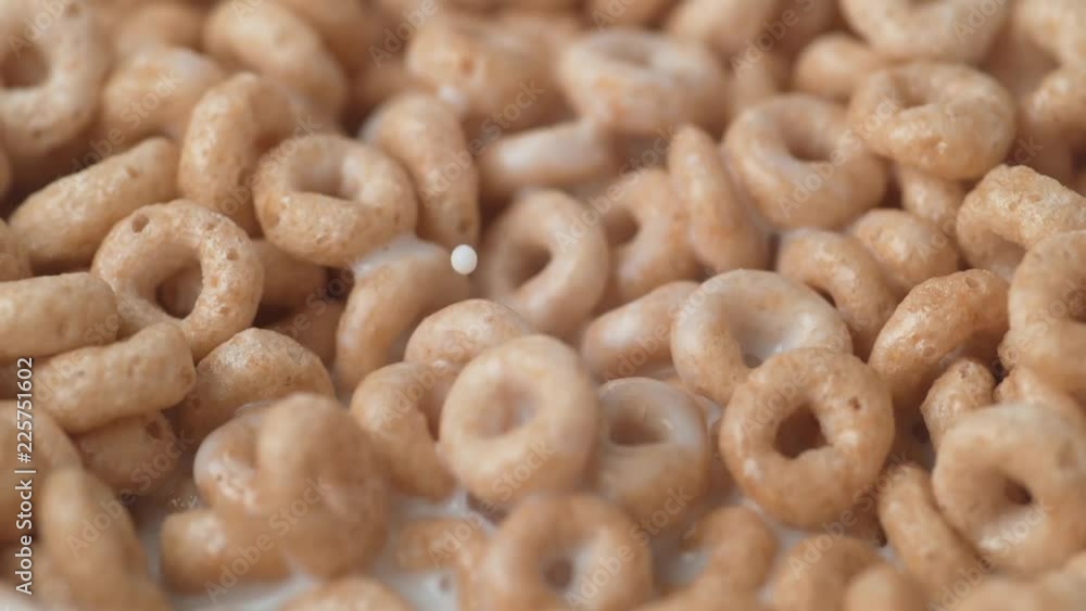 Loop of Pouing milk into cereal. Shot with high speed camera, phantom flex 4K. Slow Motion. Loop 1 of 2. Loop of Pouing milk into cereal. Shot with high speed camera, phantom flex 4K. Slow Motion. Loop 1 of 2.