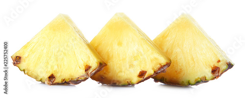 Three pineapple slices isolated on white background