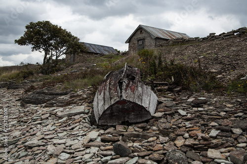 Old Boat and stonehouse photo