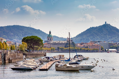 Pier with moored boats in Como
