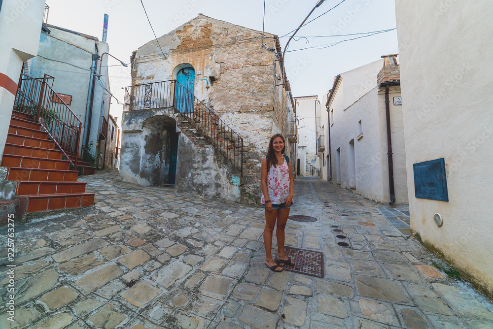 handsome tourist couple travelling in south of italy, looking cityscape of Matera, Basilicata, unesco site, capital of culture 2019. selfie photo 