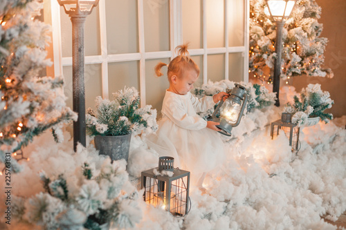 beautiful baby on christmas decorated room