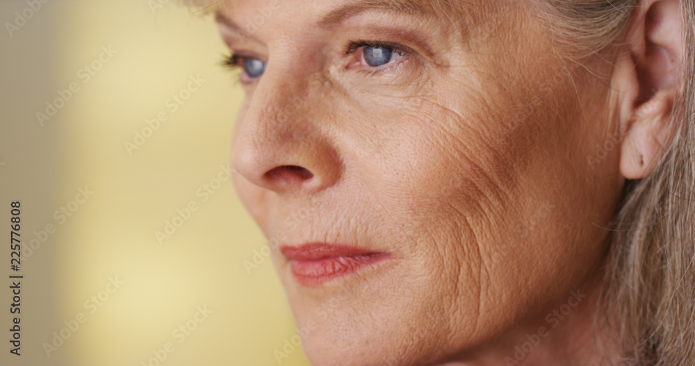 © rocketclips - Beautiful  mature woman looking away smiling