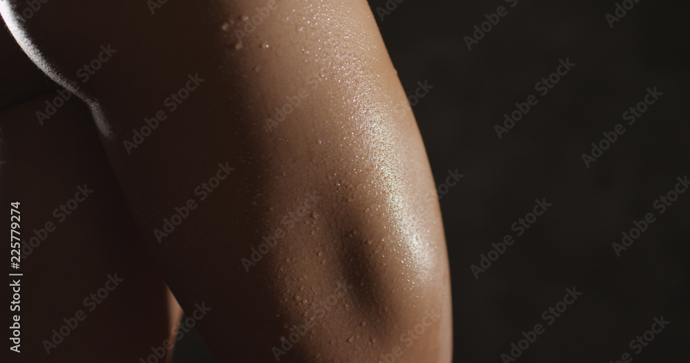 Attractive young athletic Asian woman showing curvy back Attractive young athletic Asian woman showing curvy back
