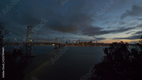 Wallpaper Mural San Francisco Bay Bridge And Evening Skyline on a cloudy day. Torontodigital.ca