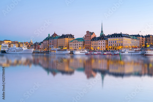 Photography Stockholm skyline with reflection at night in Stockholm city, Sweden