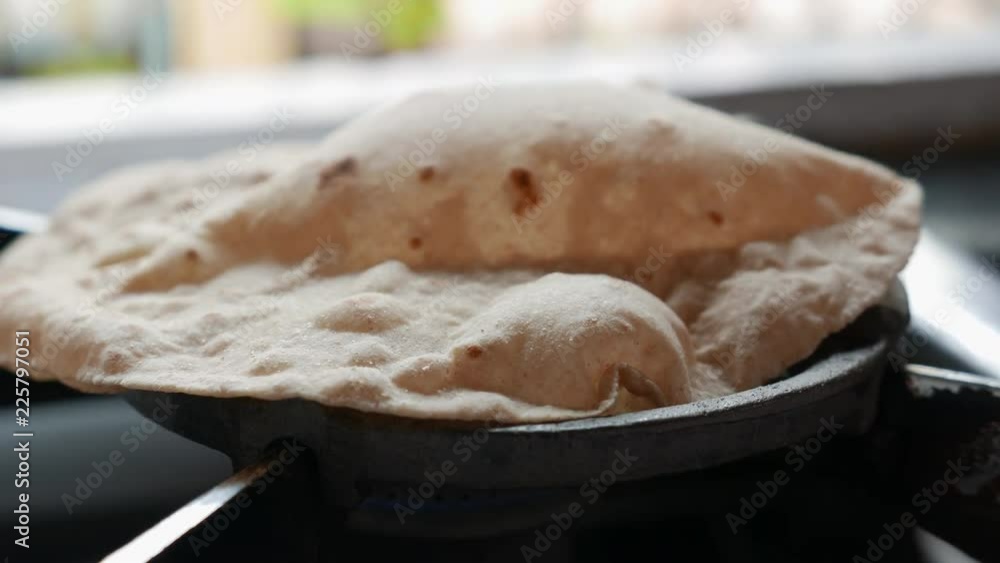 footage of making of Phulka a kind of Chapati Indian thin bread made