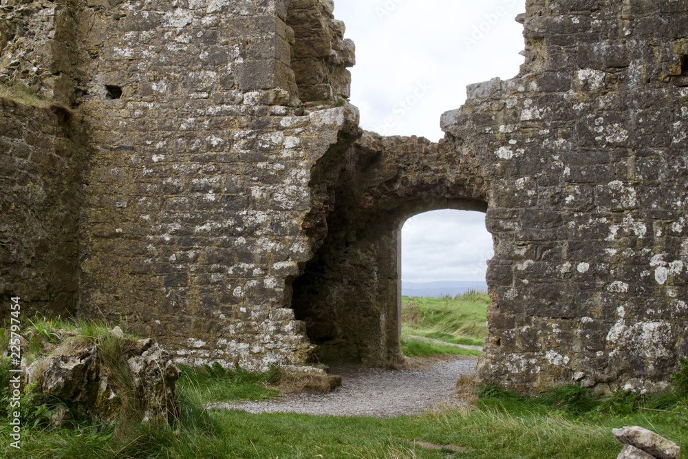 Arched stone entrance corridor in a medieval castle ruin in County Laois, Ireland (Rock of Dunamase)