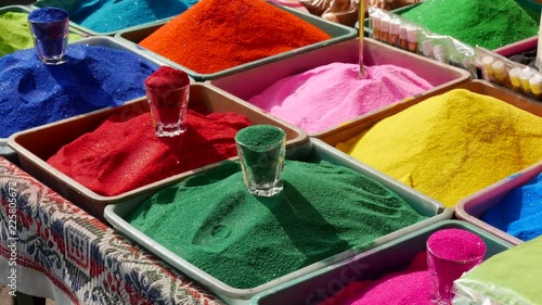  footage of Bowls of earthen oil lamps, vibrant coloured dyes and Rangoli mixed with colours for sale on road side shops in Mumbai, India for Diwali Festival.