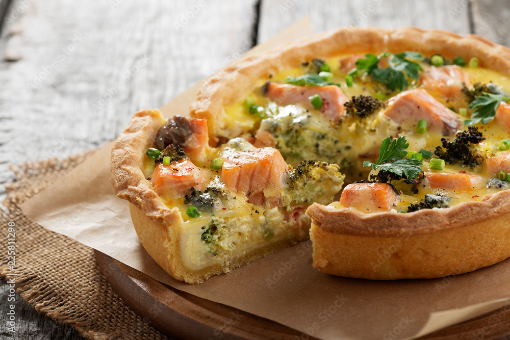 French quiches pie with broccoli,cheese and salmon. French quiches pie with broccoli,cheese and salmon.