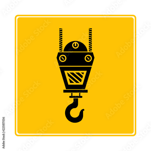 industrial hook symbol in yellow background
