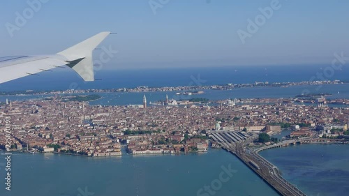4k Aerial footage of Venice, Italy from aircraft window at the time of landing giving beautiful view of Venice & surrounding area including St. Mark's square.