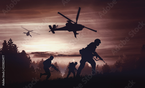 Helicopters and soldiers in...