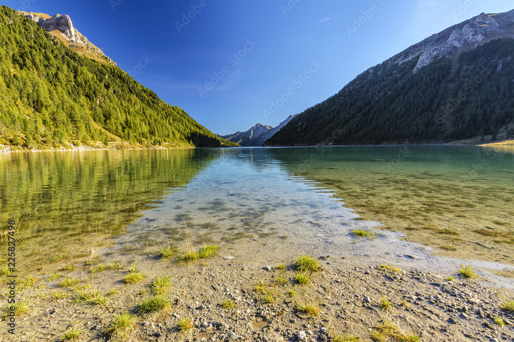 Obraz premium Lappago Lake (Neves Lake) - A Glacier Lake situated in The Alps Valley (Aurina Valley) - Trentino Alto Adige