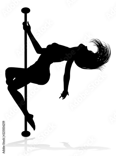 A woman pole dancer exercising for fitness in silhouette