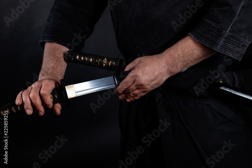 Yakuza holding katana sword