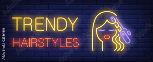Trendy hairstyles neon text and hair curler curling woman hair. Hairdressing salon, style, fashion design. Night bright neon sign, colorful billboard, light banner. Vector illustration in neon style.