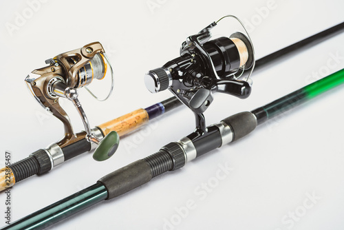 close up view of fishing rods isolated on white