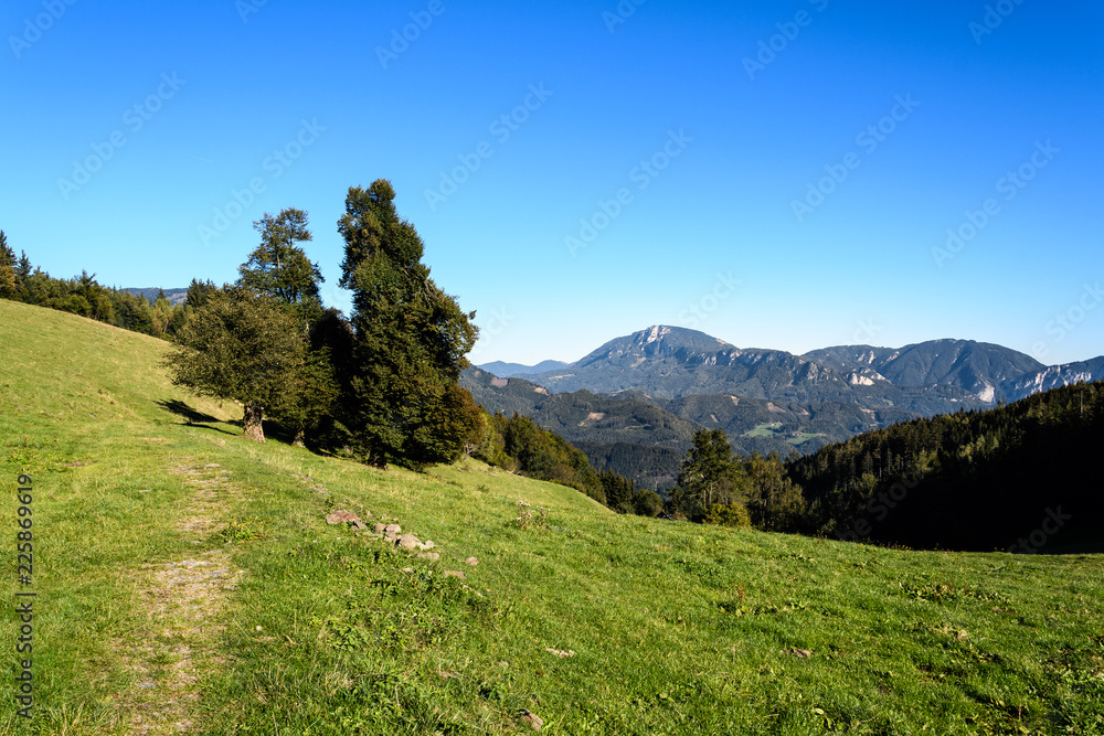 Landscape seen from Schweizeben in Styria. In the background the Rennfeld and Hochlantsch mountains. Austria