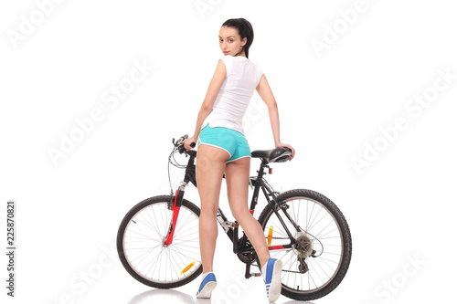 young athletic girl on a bicycle