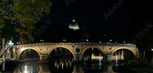 Veduta del ponte Giuseppe Mazzini e la cupola della Basilica di San Pietro in lontananza, Roma, Italia photo