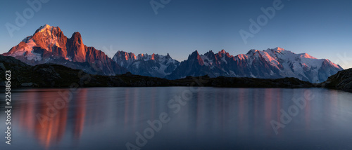 Panorama of the Alps at Lac des Cheserys during sunset. With Aiguille Verte, Auguille du Midi and Mont Blanc.