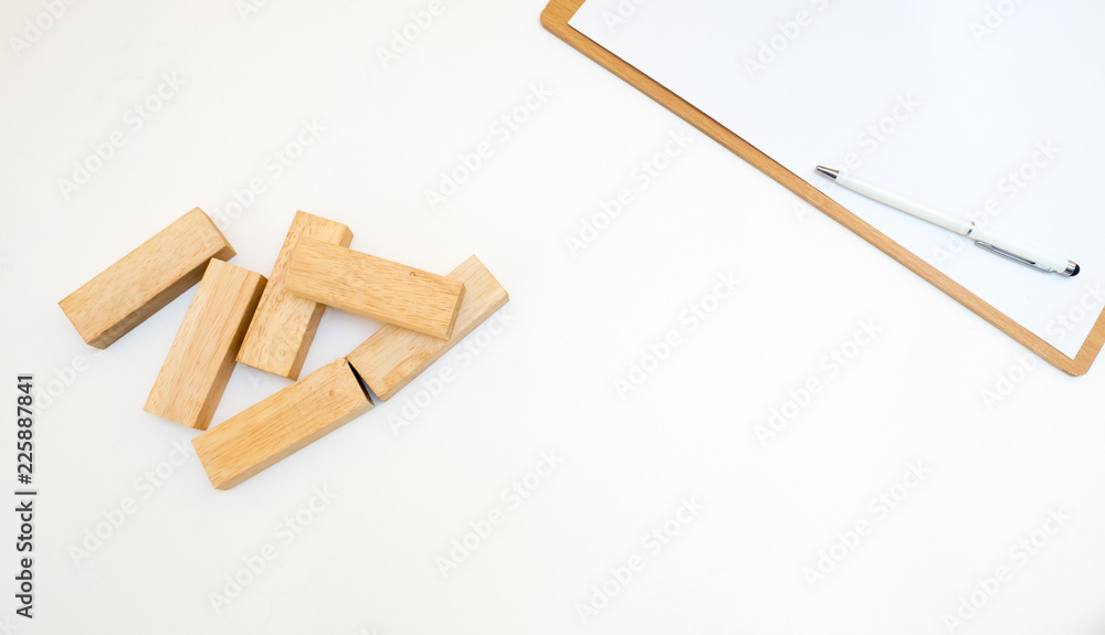 top view paper board with woodenblock white background top view paper board with woodenblock white background