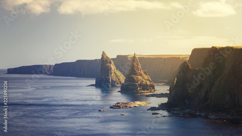 Sunset at Stacks of Duncansby, observatory and bird farm, Duncansby Head, John o 'Groats, Caithness, Scotland photo