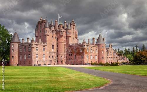 The Castle of Glamis is the typical Scottish castle, stately, full of turrets and battlements, was the legendary stage of Shakespeare's Macbeth. photo
