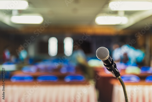 Blurred and Soft focus of head microphone on stage of Education meeting or event whit blurred background,Education conference and business event on stage concept and copy space