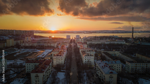 sunset over the city severomorsk photo