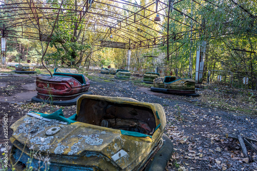 Pripyat city of ghost and playground with cars photo