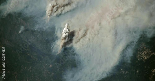 Very high-altitude overflight aerial of the Ferguson fire near Yosemite National Park, 2018. Clip loops and is reversible. Elements of this image furnished by USGS/NASA Landsat photo