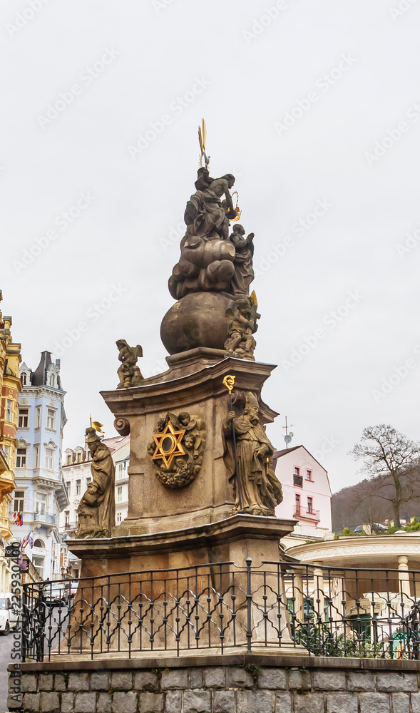 Holy Trinity column - monument by sculptor Oswald Josef Wenda in the historical centre of Karlovy Vary Holy Trinity column - monument by sculptor Oswald Josef Wenda in the historical centre of Karlovy Vary