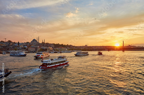 Photography Bosphorus strait with ferry boats on the sunset in Istanbul