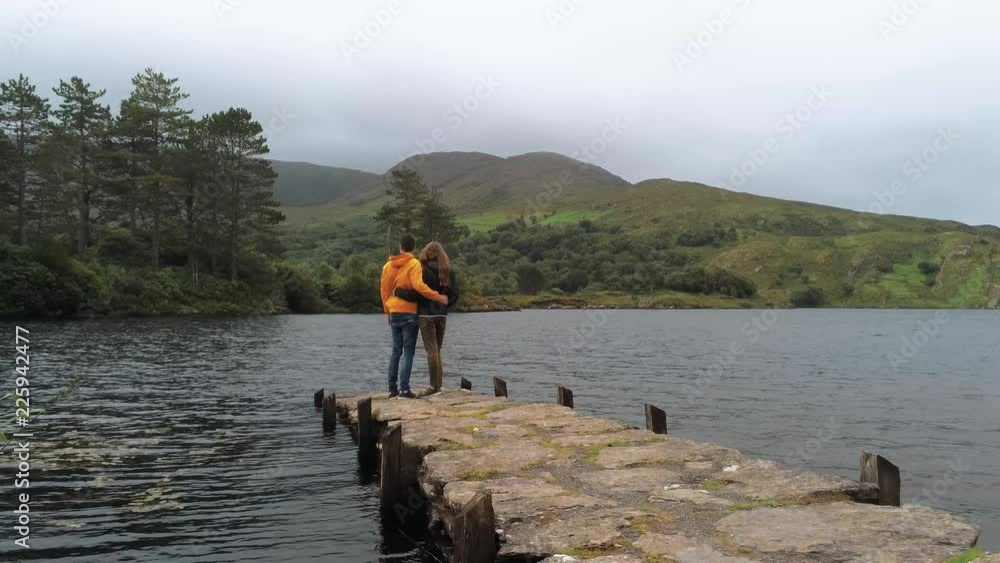 Couple in love at a beautiful lake Couple in love at a beautiful lake