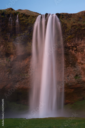 Iceland waterfall Seljalandsfoss at Sunset