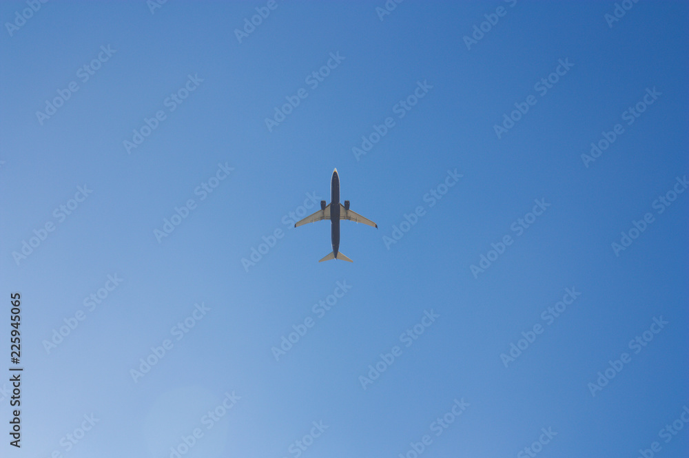 An airplane crosses the sky An airplane crosses the sky