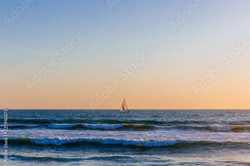 Sunset over sail boat near Venice Beach