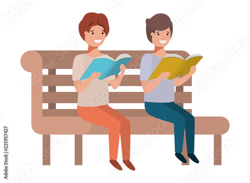 young boys sitting reading book