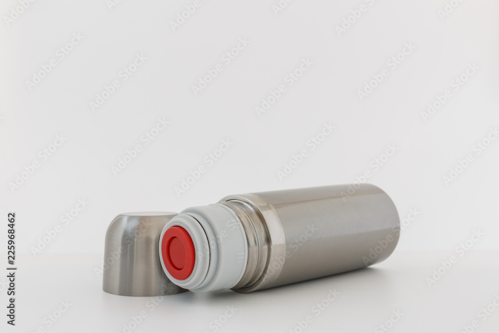 Stainless steel vacuum flask , Keep hot water on white background Stainless steel vacuum flask , Keep hot water on white background
