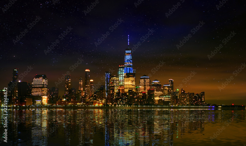 Manhattan downtown skyline with urban skyscrapers over Hudson river ,Manhattan Skyline at night.